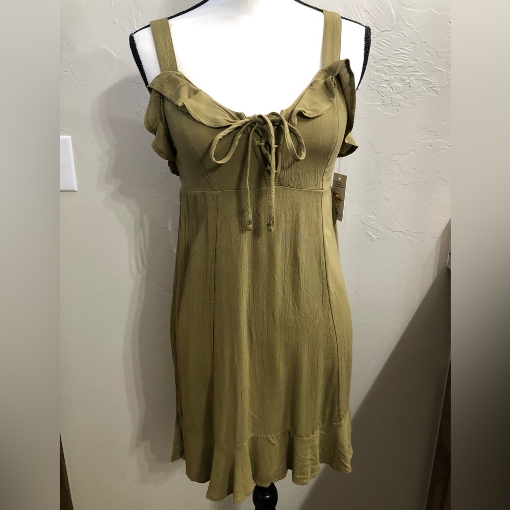 Army green stress. Never been worn tag still on.